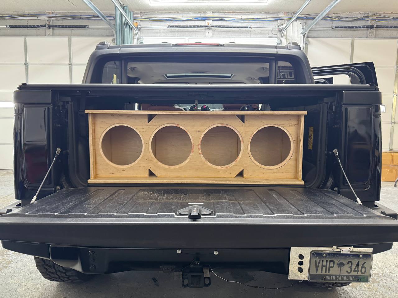 Custom Sub Enclosure in Jeep Bed